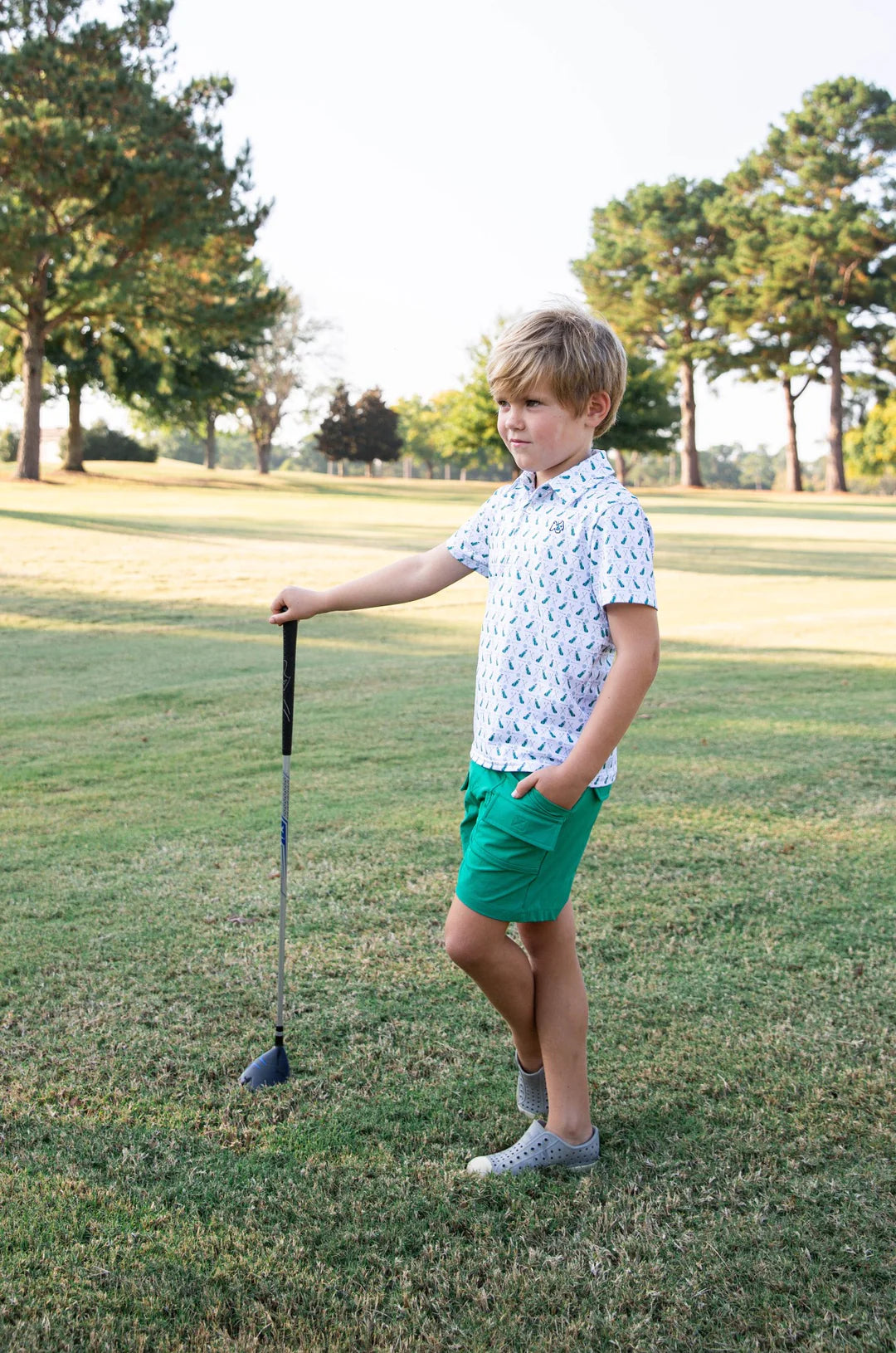 BOYS SHORT SLEEVE PRO PERFORMANCE POLO IN GOLF PRINT ON WHITE